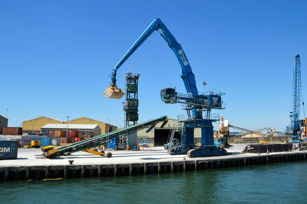 Crane lifting and transporting goods
